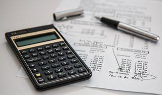 calculator over a financial document