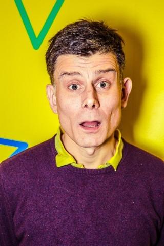 Man staring at the camera with a gasp