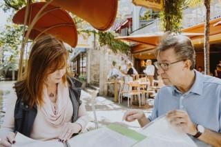 A couple at a patio lunch