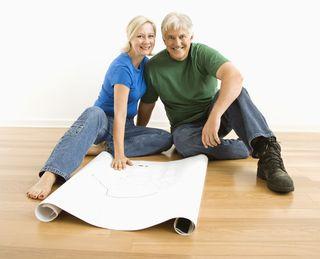 Couple Looking at Blueprints