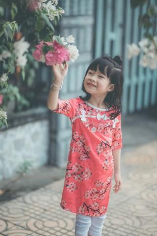 Child holding flowers