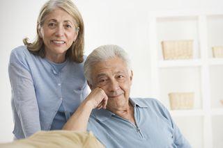Two seniors posing for camera