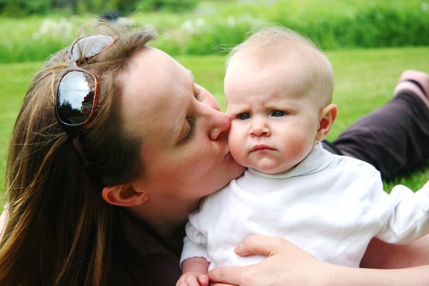 Mom Kisses Baby