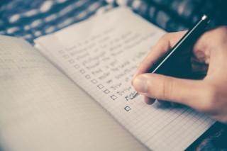 Person writing in journal