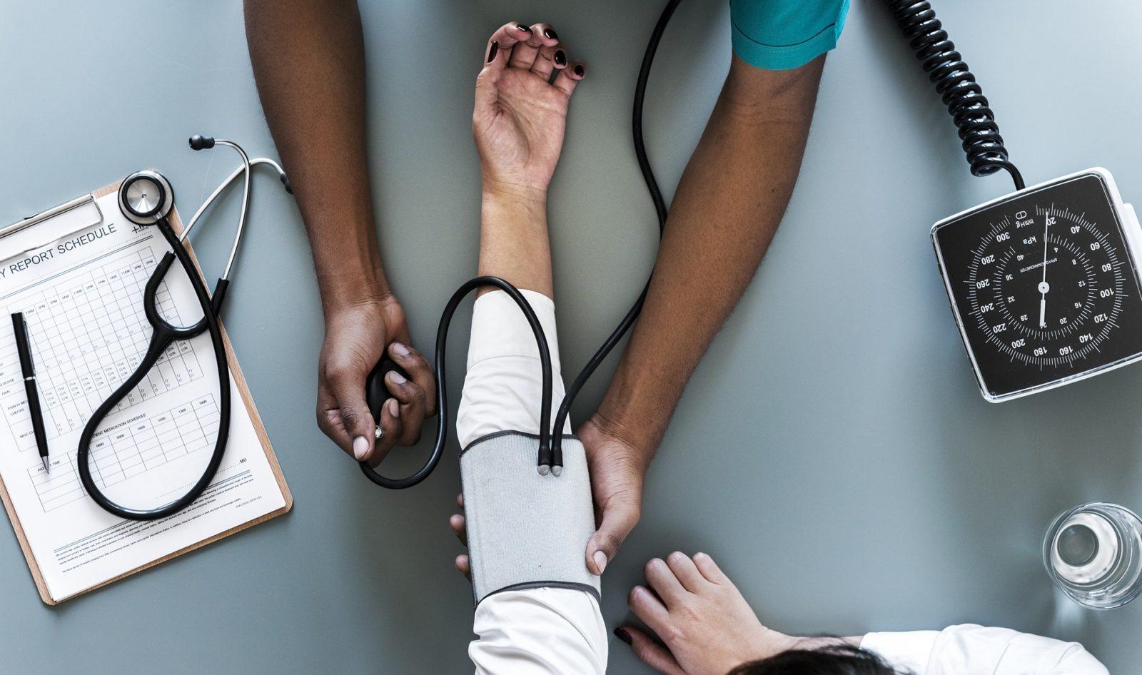 Woman Getting Blood Pressure Checked