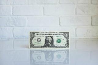 dollar bill sitting on a couner