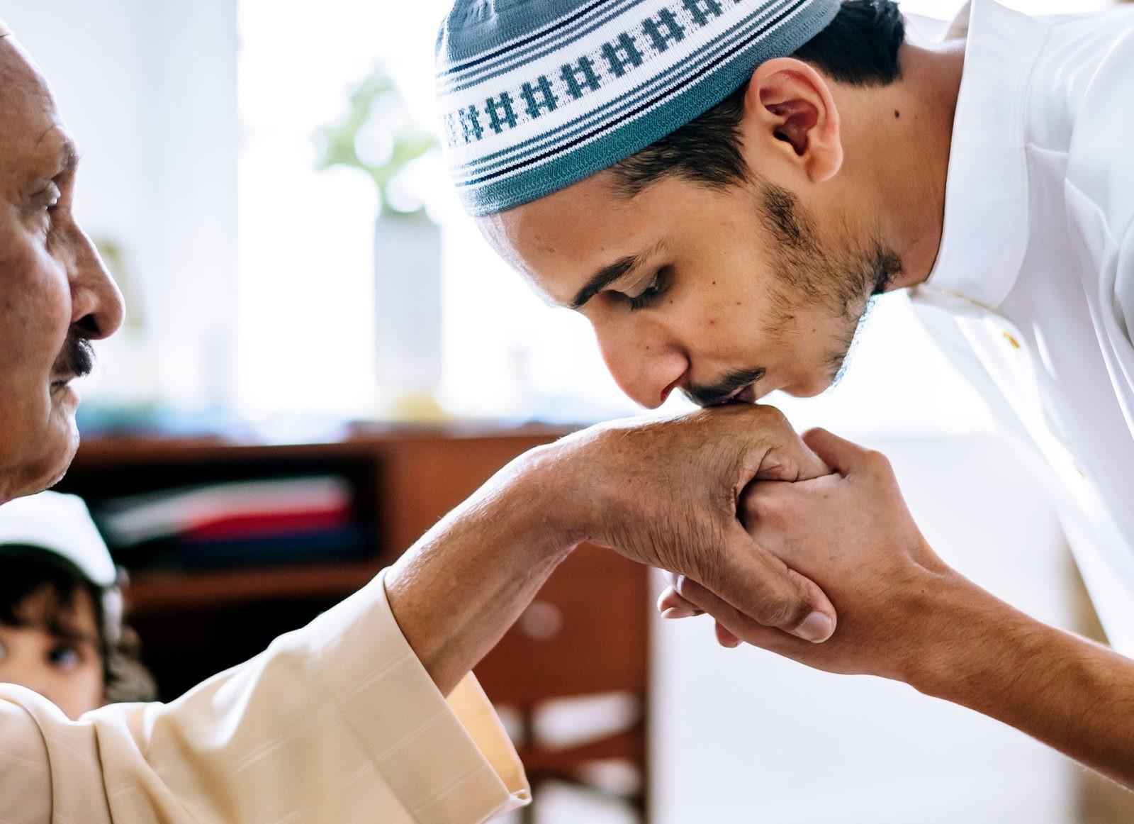 Son Kissing Father's Hand