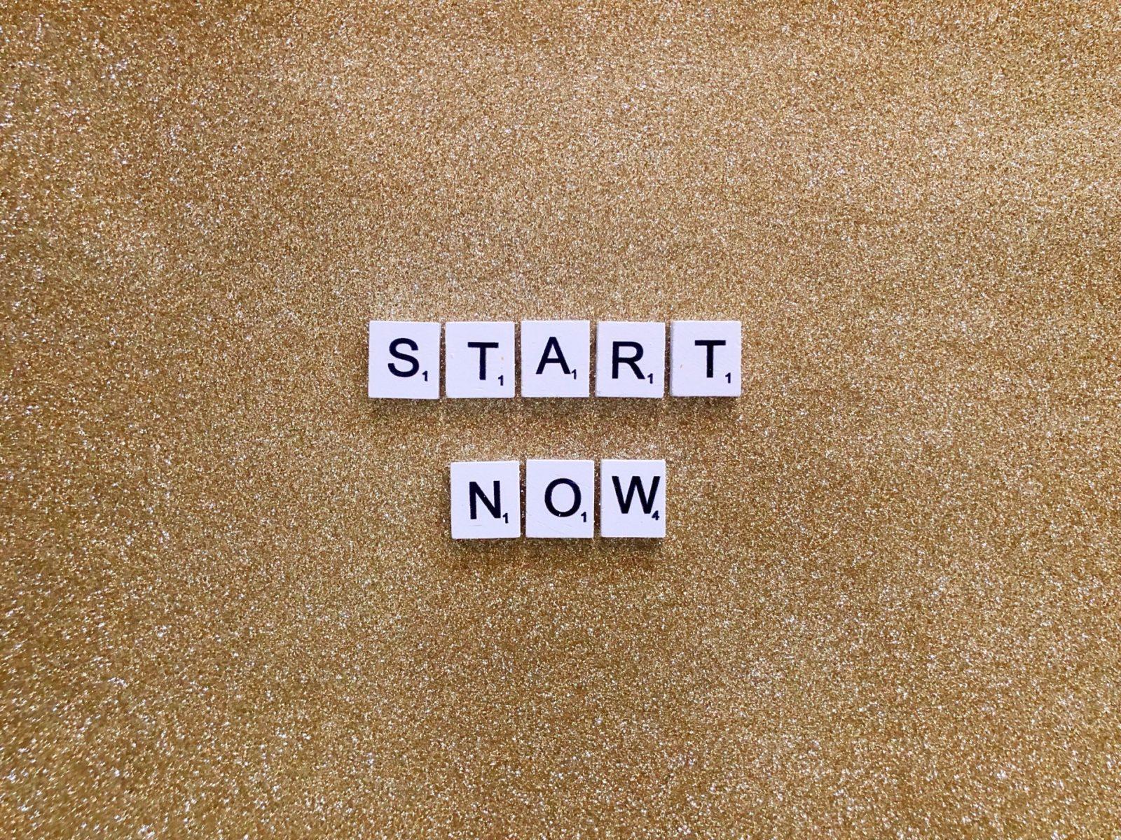 photo of scrabble board with wrods start now