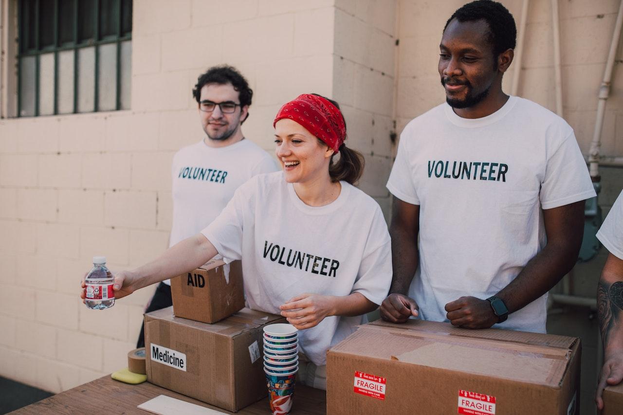 volunteers with boxes
